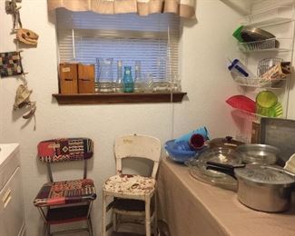 This is the laundry room, two nice vintage step chairs