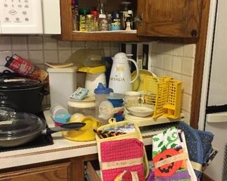 Lots of vintage Tupperware, kitchen linens, coffee items