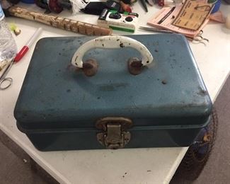 This looks like your Grand Dad's tackle box. We could not find a brand name on it. Very Cool!