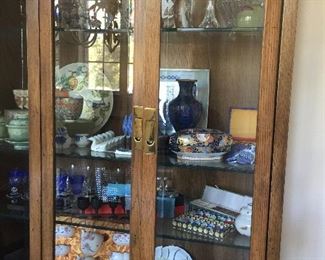 #21 The Henredon china cabinet has wonderful items inside