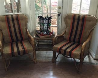 #48 Two Bamboo wing/arm chairs with original cushions, side table