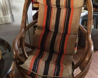 #9 There are two Bamboo rocking/swivel chairs also with original cushions