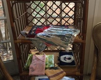 The Bamboo shelf is holding a great selection of Chinese silk cushion covers and other textiles