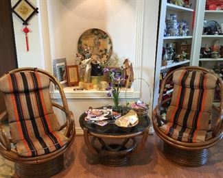 #10 The two bamboo  rocking/swivel chairs and coffee table