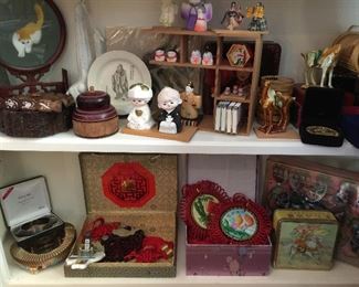 Shelf holding wonderful small collectables, more Chinese Knot pieces, Beijing Olympics memorabilia, Chinese Tang Dynasty style horses, wood bowls and boxes
