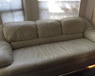 Vintage cream leather sofa. (There are more pieces upstairs)