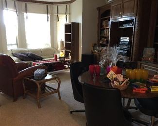 Looking into part of the Den. Mid-Century Cromecraft table with 4 chairs, great glass ware