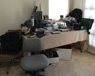 Office supplies and two of three office chairs