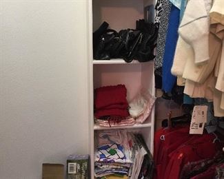 Lots of purses and bags, exercise equipment, t-shirts