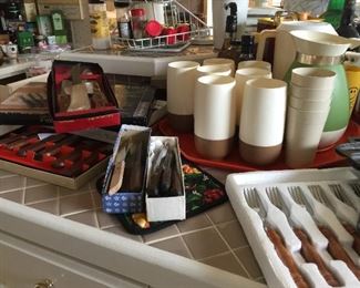 Lots of cooking knives and steak knives