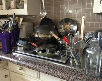 More pots and pans, lots of utensils