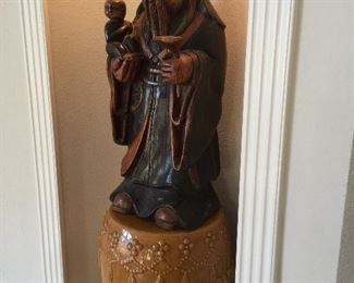 Statue of Fuxing, one of the three stellar gods know collectively as Fulushou. He is one of any Chinese gods who bestow happiness on their worshipers.