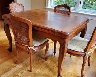 table: 32"h x 50"w x 36"d.    chairs: 38"h x 21"w x 23"d