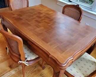 table: 32"h x 50"w x 36"d.    chairs: 38"h x 21"w x 23"d