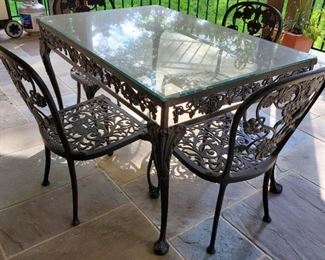 table: 29"h x 48"w x 32"d.  chairs (4): 33"h x 19"w x 21"d