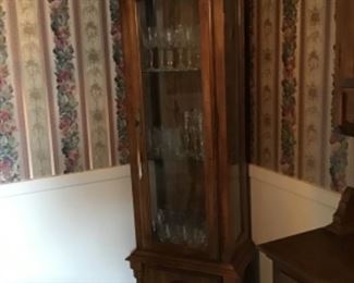 Glass front tower with light inside