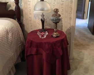 Covered table in BR left of hall bathroom 