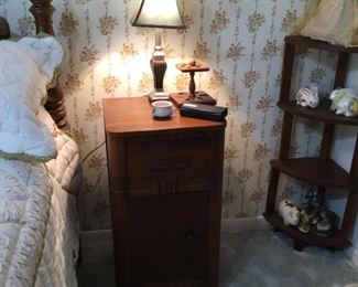 Bedside table in BR right of hall bathroom 