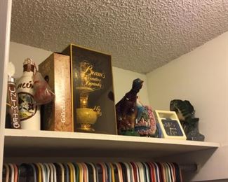 Decanters in closet in BR right of hall bathroom 