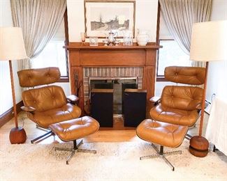 Pair Plycraft Eames-style chairs with footrests. $750 each. Lamp on left, solid teak base and neck $300; Lamp on right, turned teak base and neck $325.