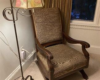 This platform rocker has some very special upholstery fabric. My client's in-laws were close friends with Frank Lloyd Wright and his wife in Wisconsin. Both families helped to build the First Unitarian Society's Meetinghouse in Madison. Mrs. Wright and my client's mother-in-law learned to weave just to create the fabric originally used on the upholstery and drapes for the meeting house. This chair is upholstered with some of that fabric. 