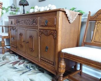 1920's antique dining room set.  Table, 1 captain chair, 5 chairs, hutch, buffet.  Beautifully restored.