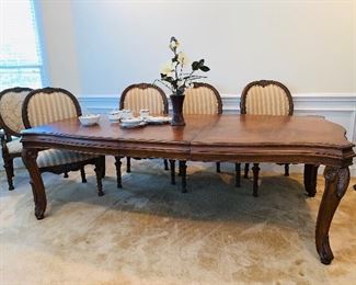 Drexel Dining Room, Table, Two Leaves, Six Chairs including two Captains Chairs and four dining chairs.