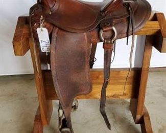 245
Vintage Buckaroo Western Saddle
14" Vintage Buckaroo Western Saddle. Serial # #8 3970. Saddle has a 3" pencil roll cantle. Front and rear cinch. This saddle is in good condition and real cute too.