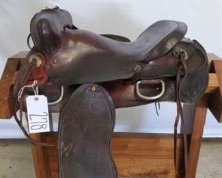 278
Cowboy Western Saddle
15 1/2" Cowboy Western Saddle. Has vintage western conchos and don't have to worry about grabbing on to a horn. Needs some repairs.