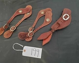 199
Three Sets of Leather Spur Straps with some silver conchos
Three Sets of, never used Leather Spur Straps with some silver conchos and buckles.