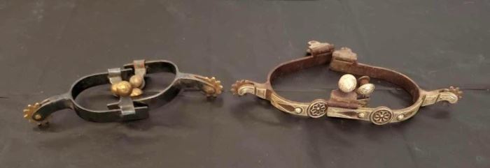 196
Spurs, Spurs and Spurs
Two sets of spurs. Kids set and adult set. One set of spurs has some silver edging.