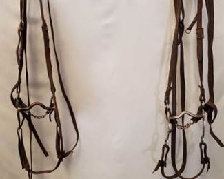 153:
Two Complete Cowboy Bridles
Two Complete Used Cowboy Bridles