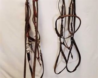 189
Two Complete English Bridles with Cavason and Misc English Tack
Two Complete English Bridles with cavason. Also miscellaneous English tack odds and ends, see pic.