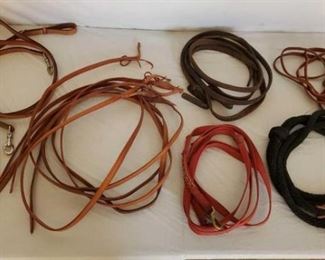 409
Roping and Split Cowboy Reins
Mixed lot of Split and roping reins all in one lot. Harness leather and nylon.