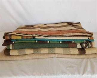 168
7- Misc Navajo Horse Saddle Pads and Blankets
7- Misc Navajo Horse Saddle Pads and Blankets
May have some old Navajos in this stack