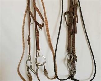 122
Two Complete Bridles One Ring Snaffle and One Tom Thumb Snaffle
Two Complete Bridles One Ring Snaffle and One Tom Thumb Snaffle