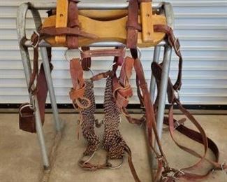 337
Difani's Back Country Made Complete Sawbuck Pack
This sawbuck pack saddle is made and designed for a lifetime of hard use. We handpick from the very best leather available, Harness leather. The breast collar and the breeching are rolled to prevent soring or chafing. We use stainless steel hardware, including the roller buckles on the quarter straps, for easy adjustment. Makers mark in pics