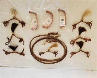 359
New Cowboy Harness Horsehair Tassel Chin Strap, Harness Leather Chin Straps and Roping Reins
New Cowboy Harness Horsehair Tassel Chin Strap, Harness Leather Chin Straps and Roping Reins
Harness leather Roping Rein with rawhide connectors
7- Horsehair chin straps
3-Colorado Saddlery chin strap new in bags
All new, some with tags