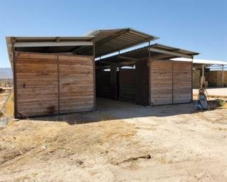 600	

14- Stall Barn with Breezeway
14- Stall Barn with Breezeway.  Barn size is 30' wide x 72' long x 12' tall
Breezeway is 10' wide
12 stalls are 10' x10' and one large stall is 10' x 20'
Barn was last used to house chickens and has some added doors and wire.
Buyer will have to dismantle and remove off of property at their own risk
Tractor not included