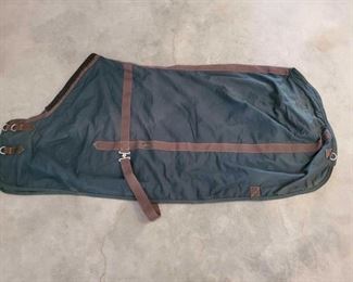 530
4-Brand Name Horse Sheets and Blankets
1- Galveston Equine Enterprises Sheet, size 78. Needs repair, tear near rear of blanket and missing back leg strap. (see pictures)
1- Rocking SP By Smart Pak Nylon Sheet, size 78 in good using condition.
1- The Horse Clothesline Fly Sheet, size 78, needs front strap (see picture)
1- Kensington Protective Sheet, size 78. In good using condition. It is missing the belly strap but could be an easy fix.