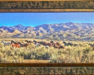 Lot 44: "Running Free" Ranch life photography on canvas by Rhonda Graham 
This print was taken on a bright winter day. Earl and I were out doing a livestock check and we had lots of wonderful visitors that came to see us. The picture was taken at the Las Flores Ranch in Summit Valley, Ca. Flores in Summit Valley, Ca. This print comes with a letter of authenticity, dated and signed by Rhonda Graham.
Size; 24" x 14" including frame