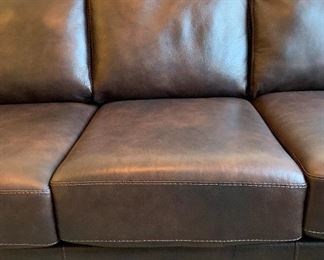 Ashely Furniture Bristan Leather Nail Head Sleeper Sofa Queen	39x90x40in	HxWxD
