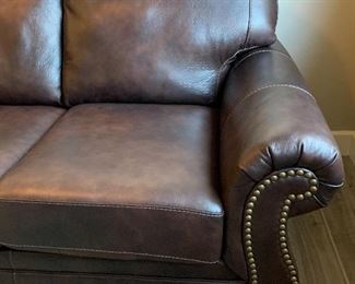 Ashely Furniture Bristan Leather Nail Head Sleeper Sofa Queen	39x90x40in	HxWxD
