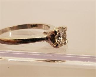 14k white gold and tested diamond ring