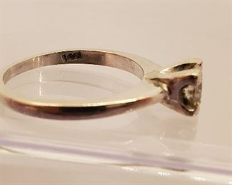 14k white gold and tested diamond ring