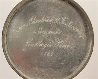 engraving on the inside of the lid of the beer stein