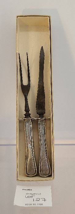 Antique Sterling Silver carving set of fork and knife please view for weight and size.