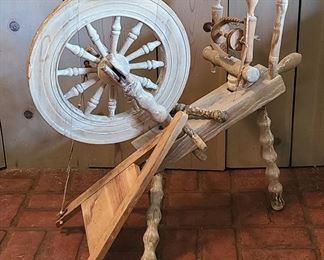 Antique spinning wheel please view for condition.