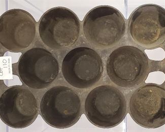 Antique cast iron muffin pan