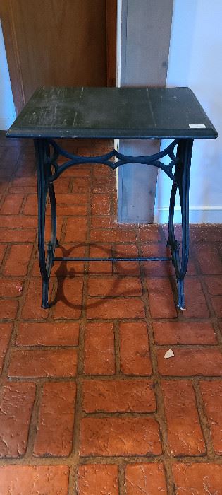 Small antique table with base from the Valentine Meat Juice Company